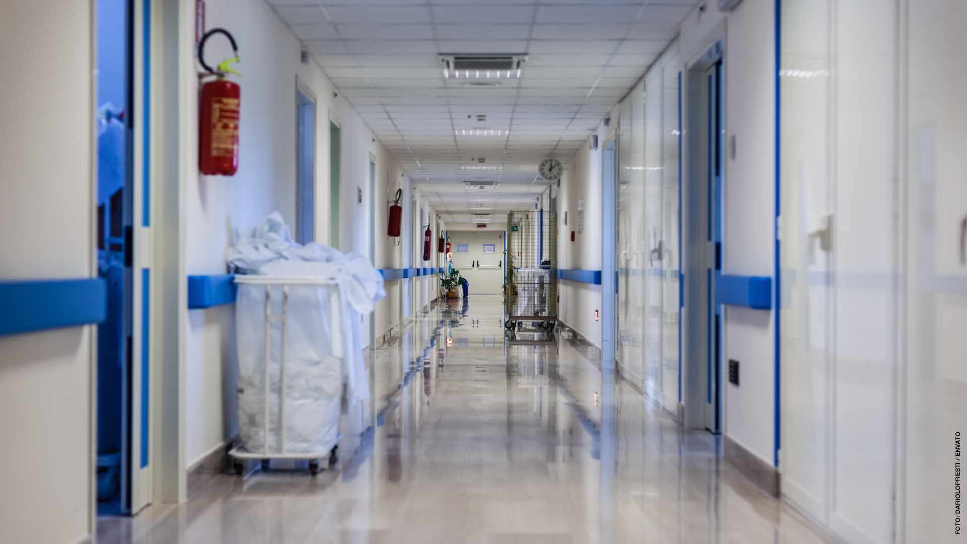 a clean and empty hospital corridor with nobody on sight
