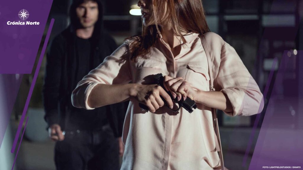 woman with gun near thief at night